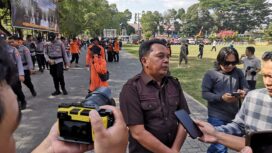 Wakil Ketua I DPRD Kabupaten HSS Husnan saat menghadiri apel siaga Karhutla di Lapangan Lambung Mangkurat, Kandangan. (npm)